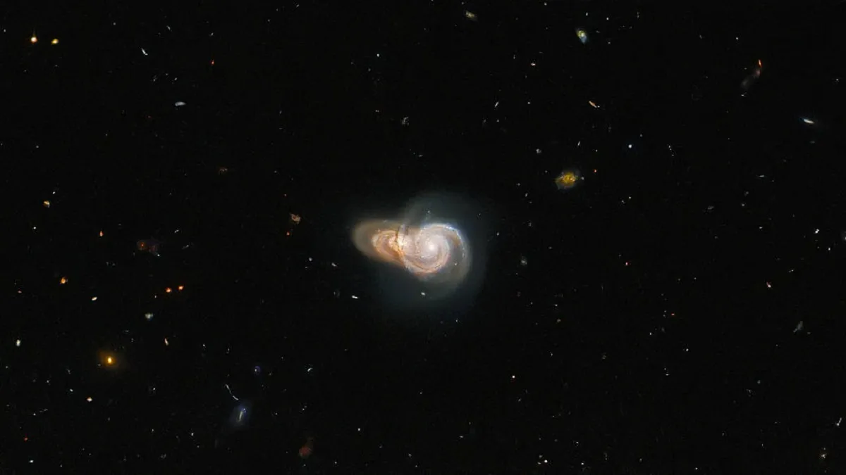 Telescopio Hubble captó el encuentro dos galaxias espirales superpuestas