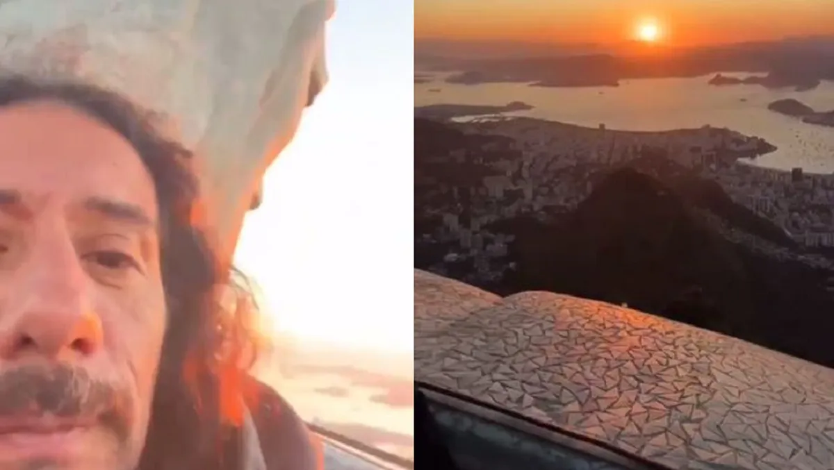 Hombre que vive dentro del Cristo Redentor muestra la vista desde el punto más alto